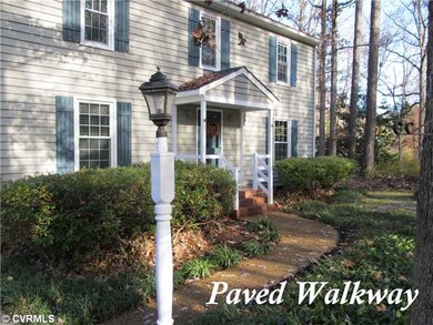 Exterior Front - AGGREGATE WALKWAY AND MASONRY FRO