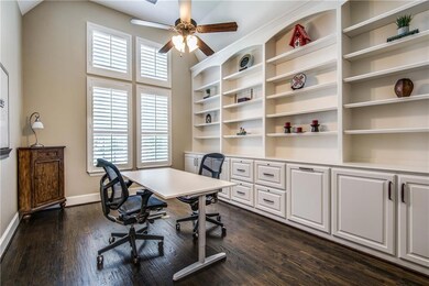 Handsome study has French doors, spectacular built