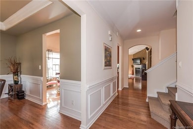 Inviting foyer with hardwood floors through out