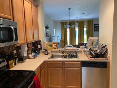 Kitchen open to dining & living