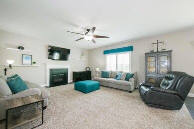 Love the cozy gas fireplace in this living room!