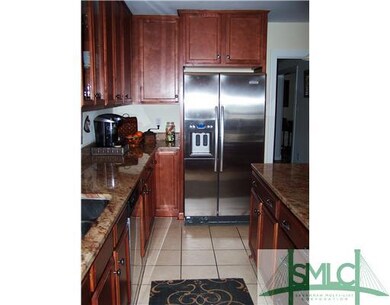Kitchen. KITCHEN HAS BREAKFASTBAR ON ISLAND, TILE 