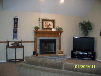 Wood/Gas fireplace makes this a relaxing living ro