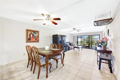 Tiled dining space featuring ceiling fan and a tex