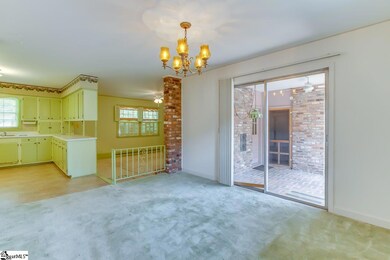 Notice the sliding glass doors to screened porch t