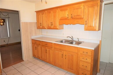Updated oak kitchen. Doorway to right leads to dec