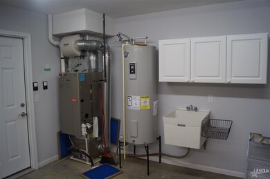 Utility sink and cabinets in the garage!