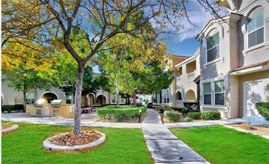 View of community with area for grilling, a reside