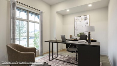 Office space featuring baseboards, plenty of natu