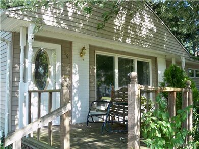 Porch - Open. Charming, shaded front porch leads t