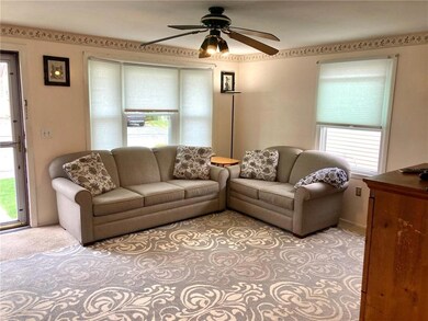 The lovely living room has the newest insulated wi