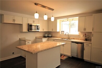 Lower unit- Kitchen is open bright and open to fam