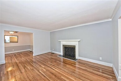 Formal Living Room leading into the Formal Dining 
