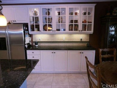 Glass front doors with LED down lighting