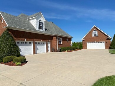This home features a double door attached garage with walk thru entry door & a two car detached garage with full attic space.
