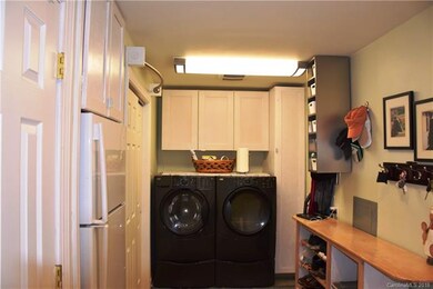 The utility/mud room provides laundry AND storage 