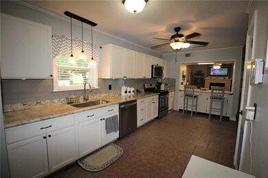 Large remodeled kitchen, granite counters, tiled f