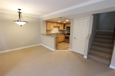 Dining Area with Kitchen in the background
