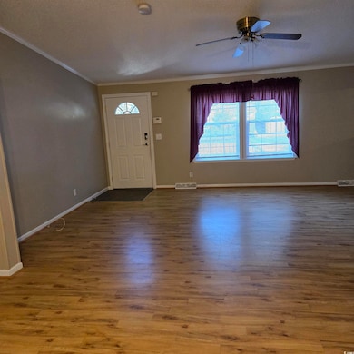 Entrance foyer with hardwood / wood-style floors, 