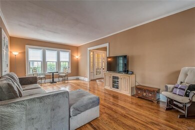 The living room has a wood burning fireplace and p