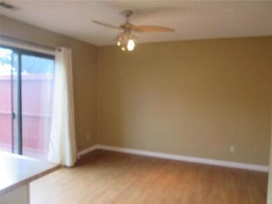 Breakfast room off kitchen with sliding door to de