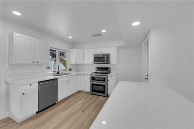 Kitchen featuring light wood-type flooring, light