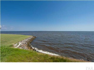 A seawall protects the shoreline of the lot