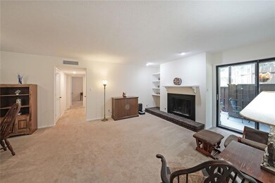Living room with brick fireplace