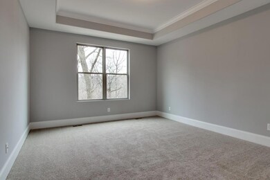 Tray ceiling in Master bedroom! Photo is an example of builder's work. Actual home built may vary.