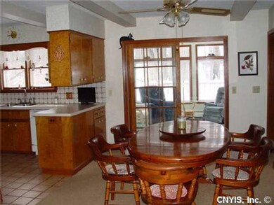Kitchen Dining with sliders to Florida room