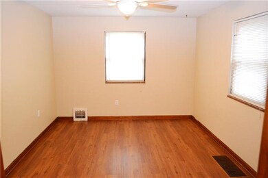 Formal Dining Room Ceiling Fan and Laminated Hardw