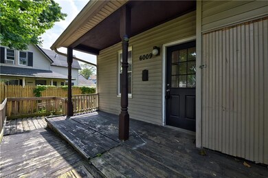 Side entrance and wrap around deck to downstairs u