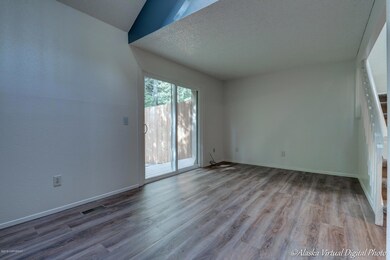 This Condo Lives Large-Vaulted Ceilings