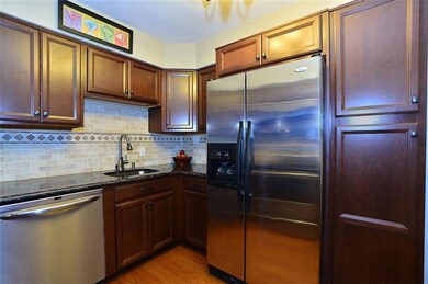 Refrigerator has 'in door' water and ice dispenser