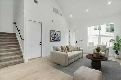 Open living with cathedral ceilings.