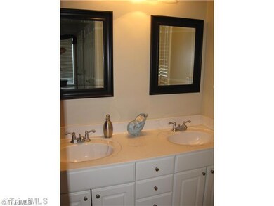 Master Bath/Spa. Updated master bath has a tub/shower combo, neutral decor and dual vanity....