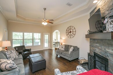 Hardwood floors in Living Room, Foyer, and Master, and Tile in Kitchen and all baths