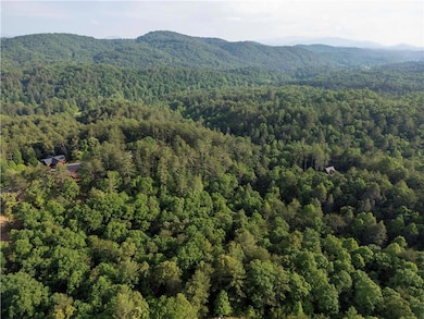 Birds eye view of property featuring a mountain vi