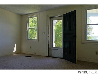 Living Room. Entrance from the porch to the living