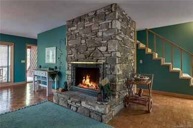One of 2 gorgeous stone fireplaces
