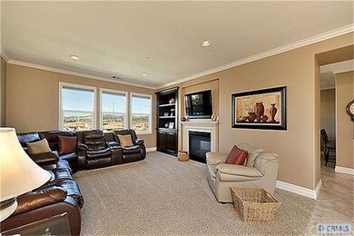 Living Room View from Entry. Custom Built-In Bookc