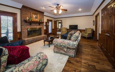 Snuggle up beside the eye-catching fireplace in th