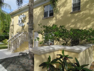 Entrance to Apt B is in the middle, up the short flight of stairs between the stone railings