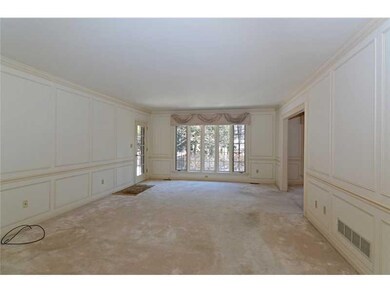 Living Room. The spacious living room offers neutr