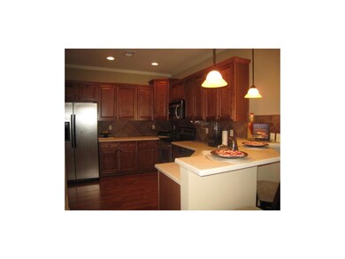The Pergo floors carry into the kitchen.  Beautifu