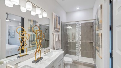 * REPRESENTATIVE PHOTO. The secondary bathroom wit