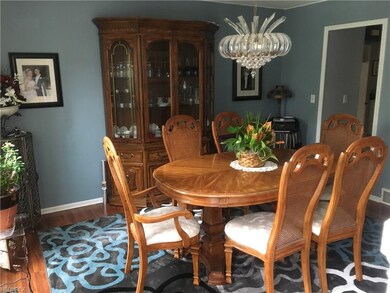 Hardwood floors and bright natural light make this