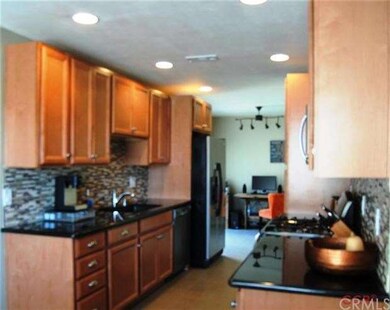 Gorgeous kitchen with brand new cabinets, tile flo