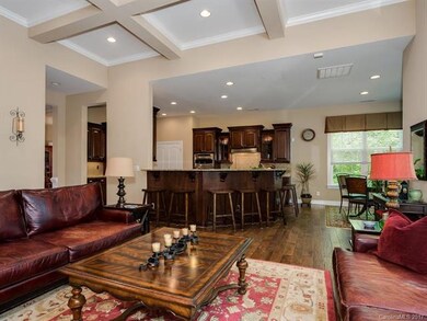 Family room looks into the kitchen & eating area
