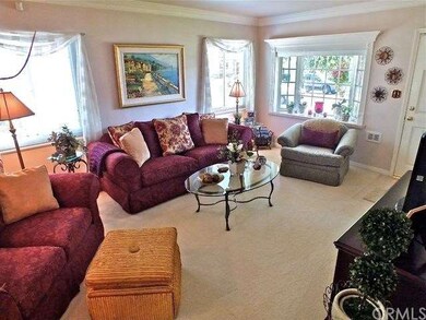 Another View of Living Room and looking through Ba